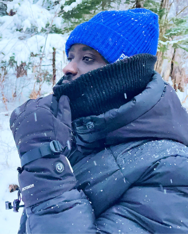 A friend named peter enjoys winter in the snow wearing arcfomor's WinterGlow heated gloves!