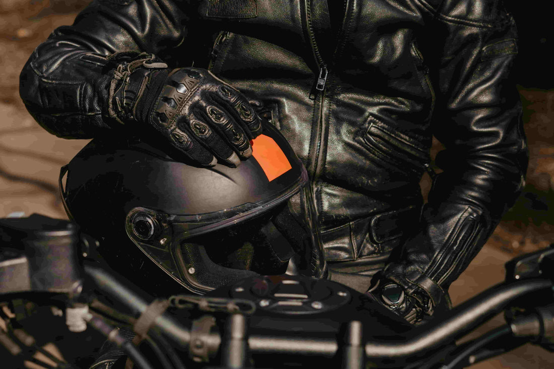 A motorcyclist wearing Arcformor motorcycle riding gloves