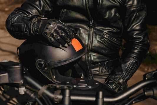 A motorcyclist wearing Arcformor motorcycle riding gloves