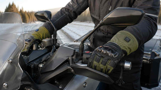 Rider wearing Arcfomor Vortex heated motorcycle gloves while holding motorcycle grips in winter