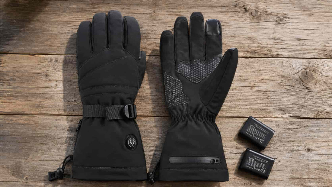 WinterGlow heated gloves and two removable batteries arranged for a condition and safety inspection