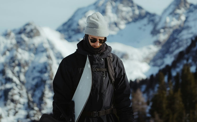 Arcfomor Expert Cold Weather Guide hero image featuring team explorers wearing UL-certified heated technology and winter gear in the Arctic snow.