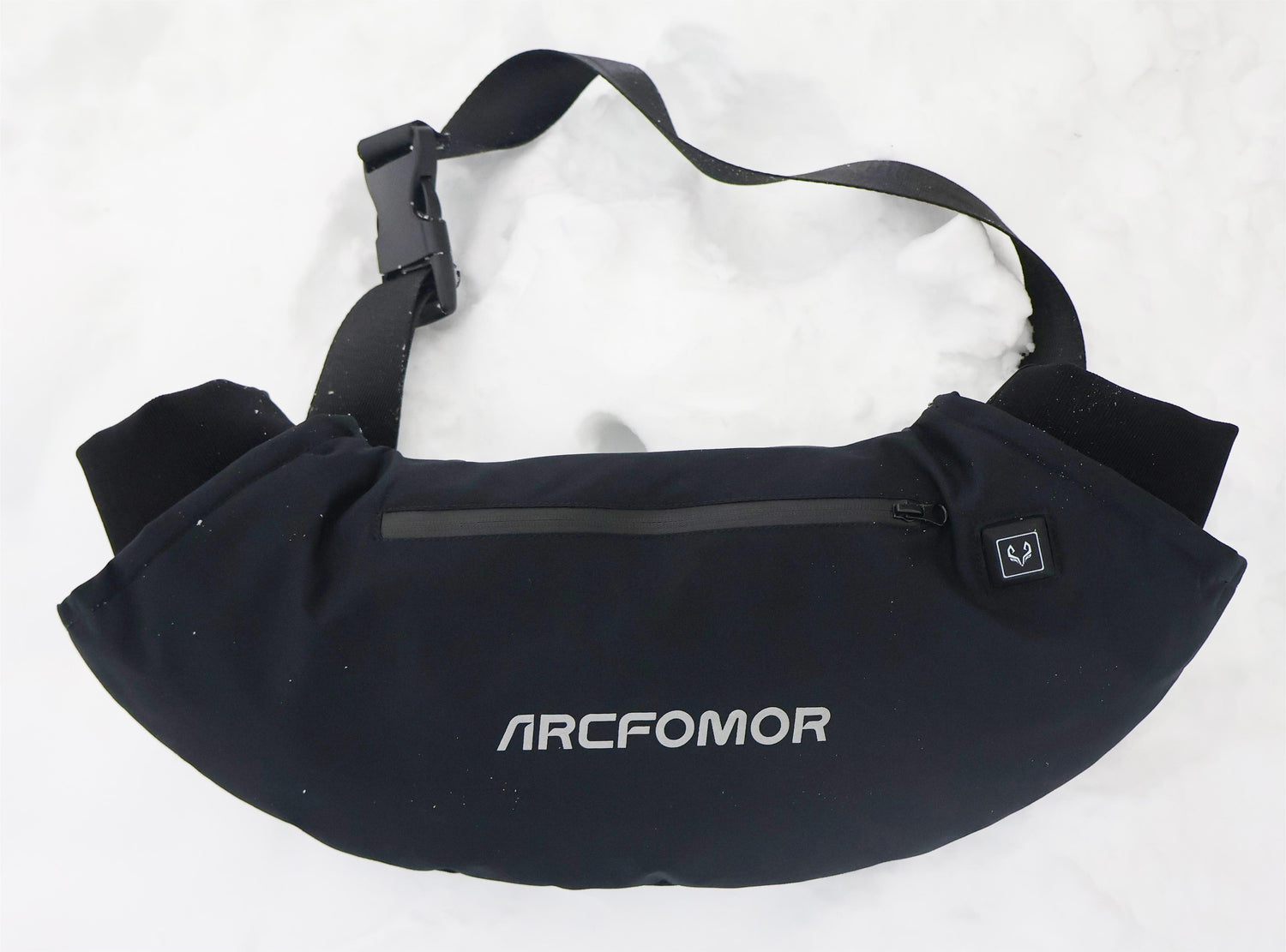 This image shows Arcfomor's heated hand warmer in a classic and durable shape, featuring a waterproof coated polyester fiber shell that keeps the interior dry and warm in wet conditions!
