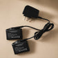 Arcfomor dual-port charger connected to two 7.4V heated glove batteries