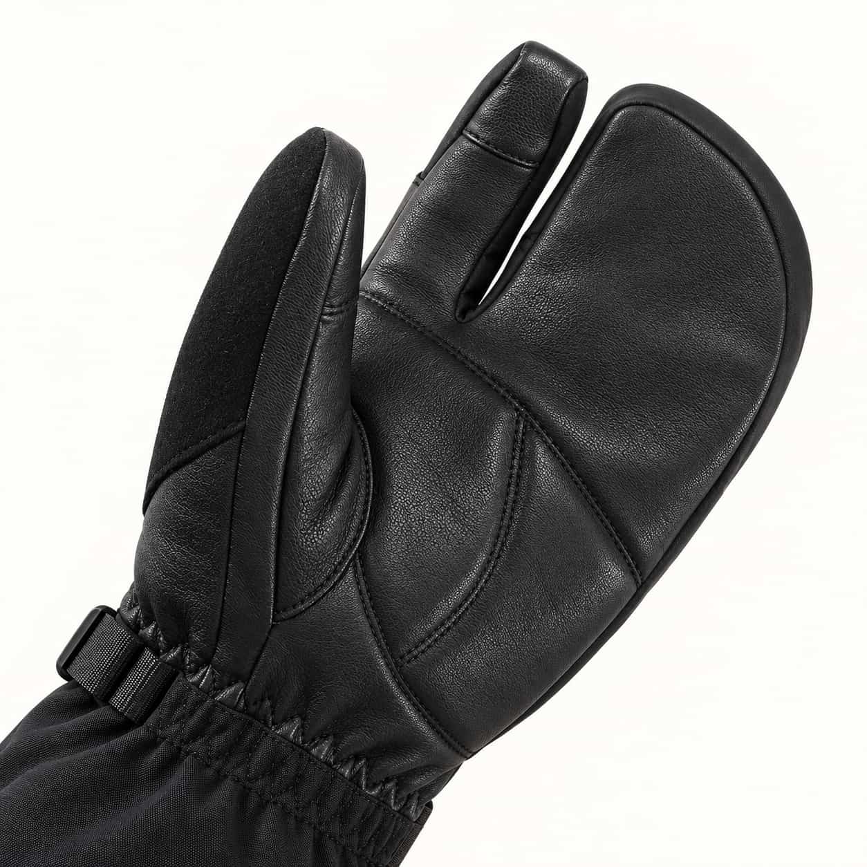 Close-up of the black goatskin palm on a Crab Claw glove, showing leather grain, the curved thumb panel and finger seams.