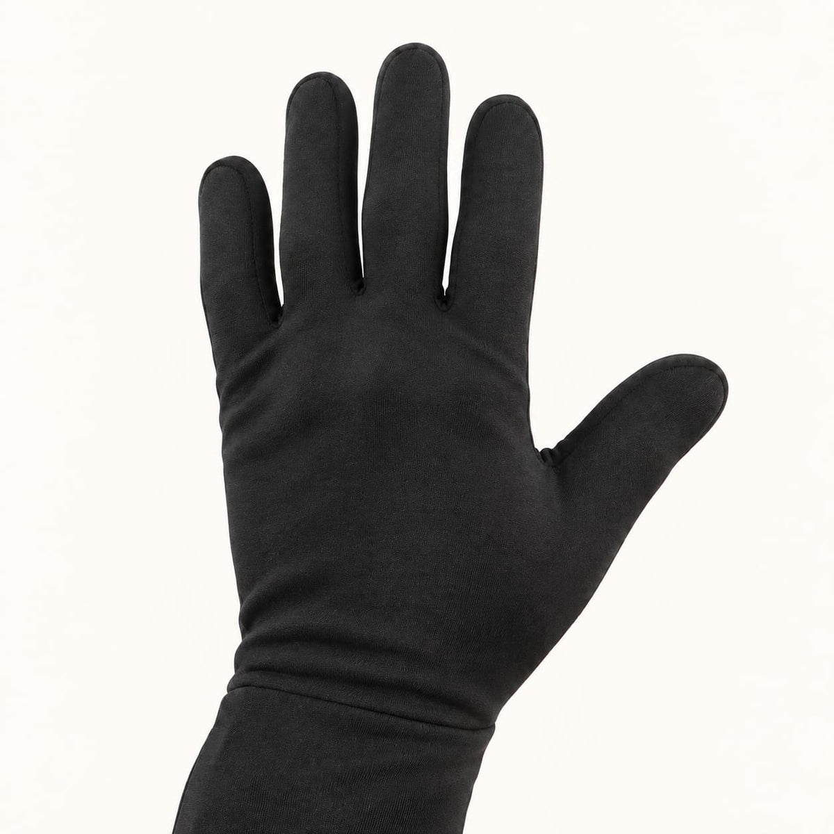 Back view of a black Dragonfly heated glove liner, showing the slim fabric construction and wrist seam.