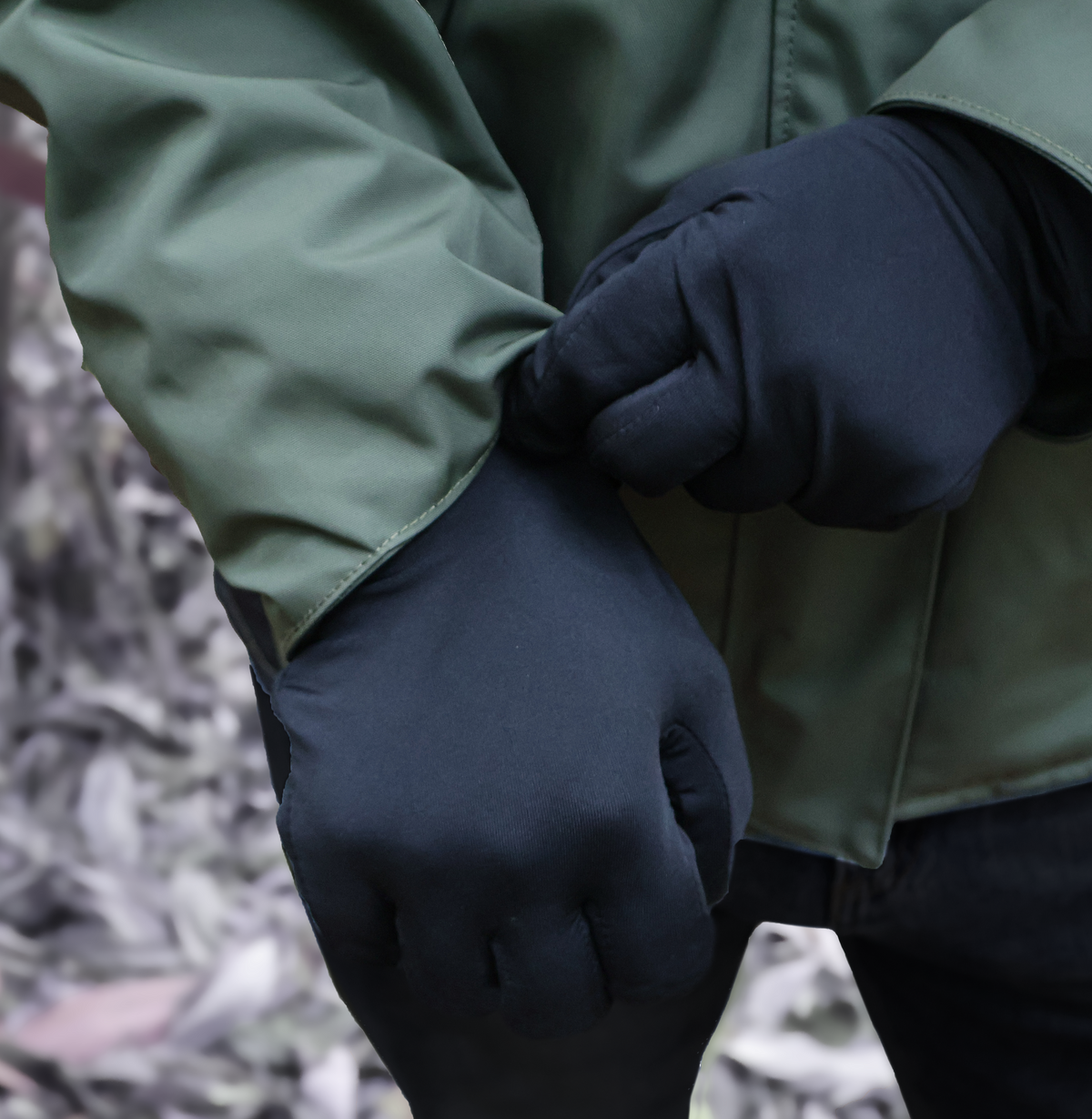 Dragonfly heated glove liner cuff adjusted beneath a winter jacket sleeve
