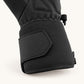 Close-up of an Ember 2.0 glove cuff showing the hook-and-loop strap, stitched edge and side zipper.