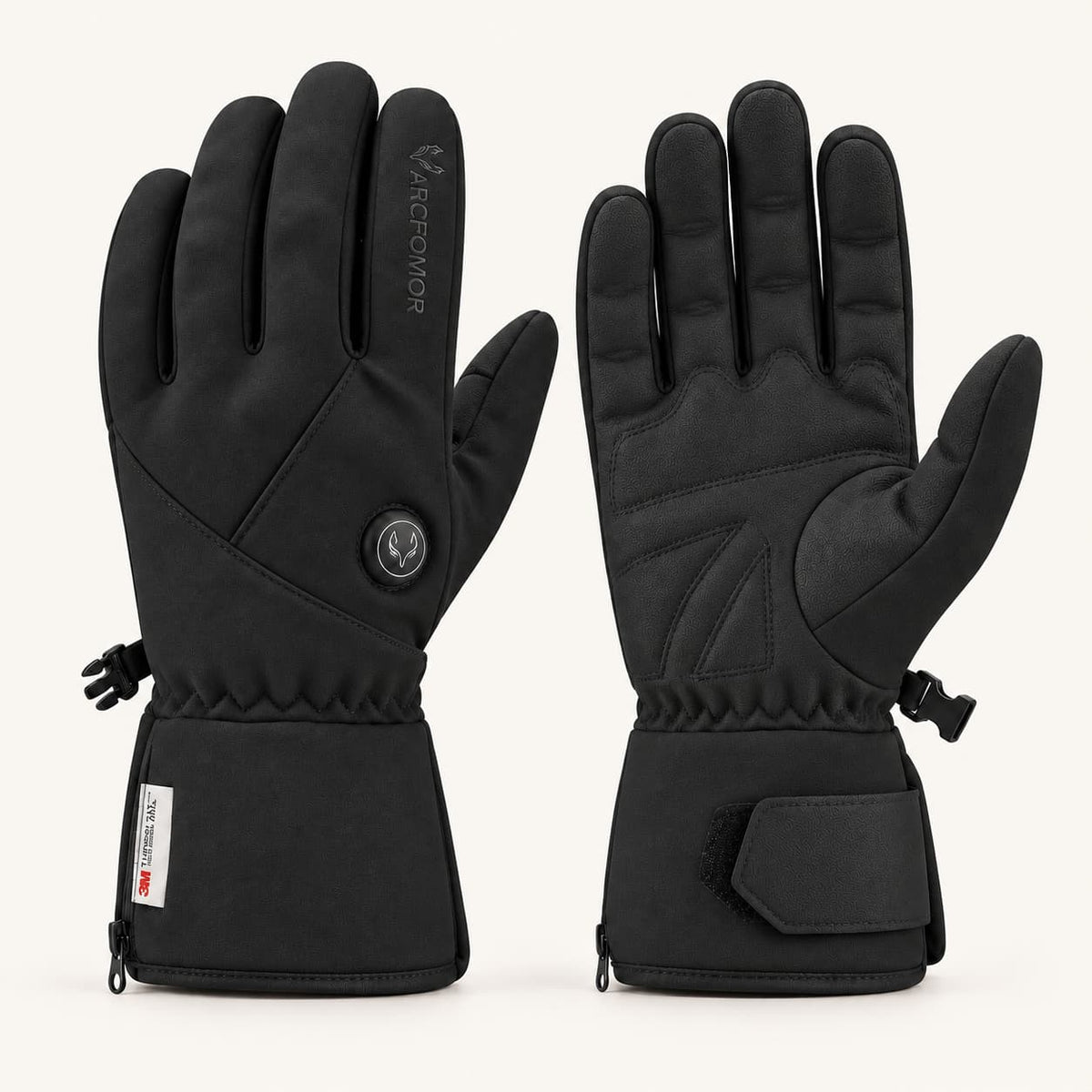 Black Ember 2.0 heated gloves shown from the back and palm, with gently curved fingers and adjustable cuffs.