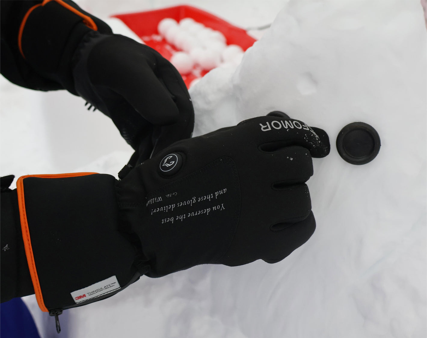 Ember 2.0 heated gloves handling light snow during outdoor winter use
