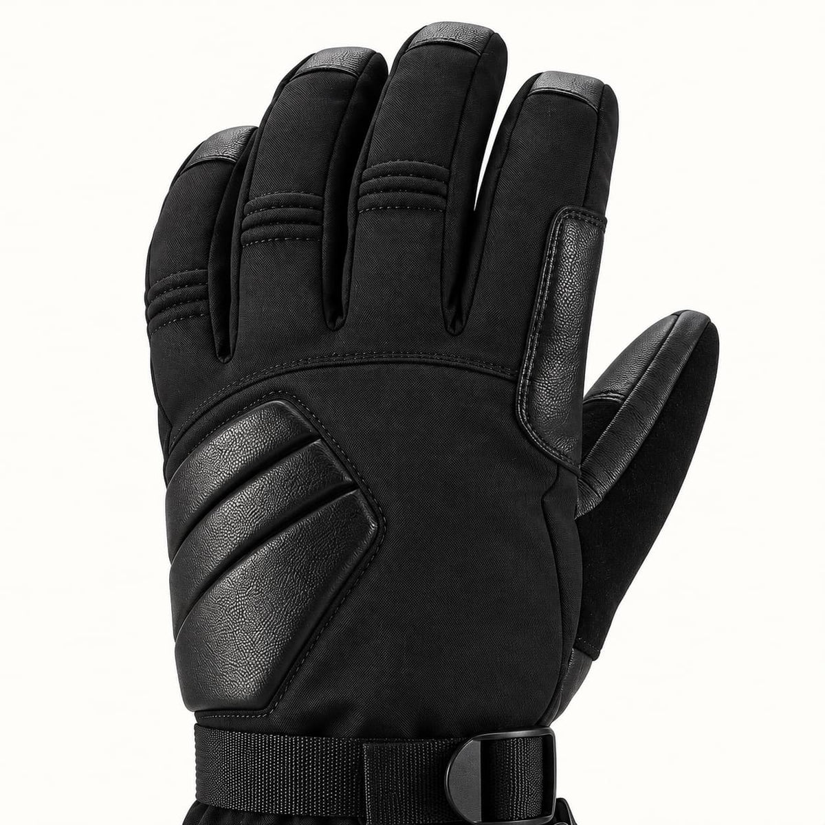 Close-up of the Helm glove's angled three-section back padding, woven textile panels and stitched finger joints.