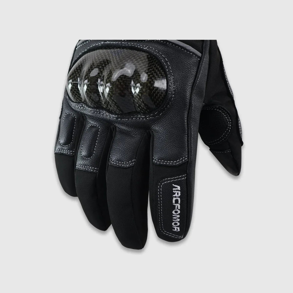 Close-up of the Onyx carbon-fiber knuckle shell and reinforced finger panels