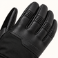 Close-up of Ottawa Nights goatskin leather showing finger-joint pleats, stitching and an embossed ARCFOMOR logo.