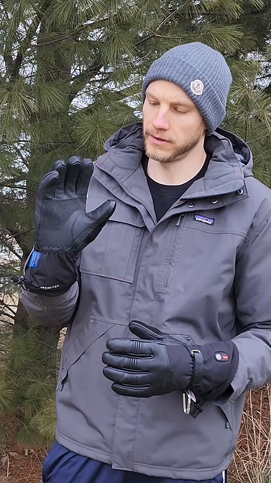 Man examining the fit of Ottawa Nights heated gloves outdoors