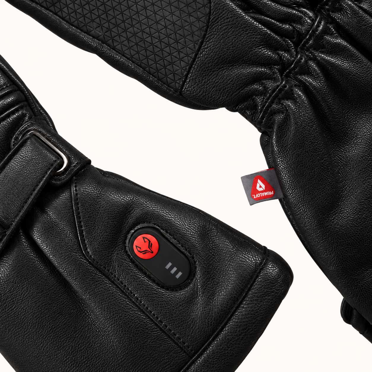 Close-up of the Polar Baron leather cuff with a red heat-control button and three indicator bars.