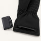 Spider Silk glove with its rechargeable battery connected beside the open cuff battery pocket.