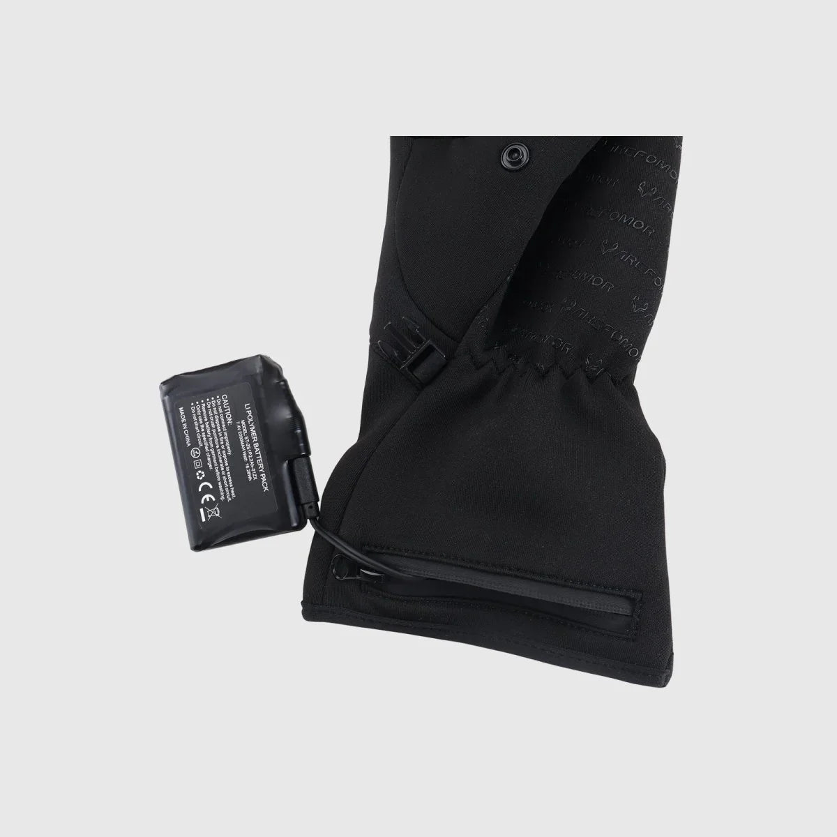 Spider Silk heated glove connected to its rechargeable wrist battery