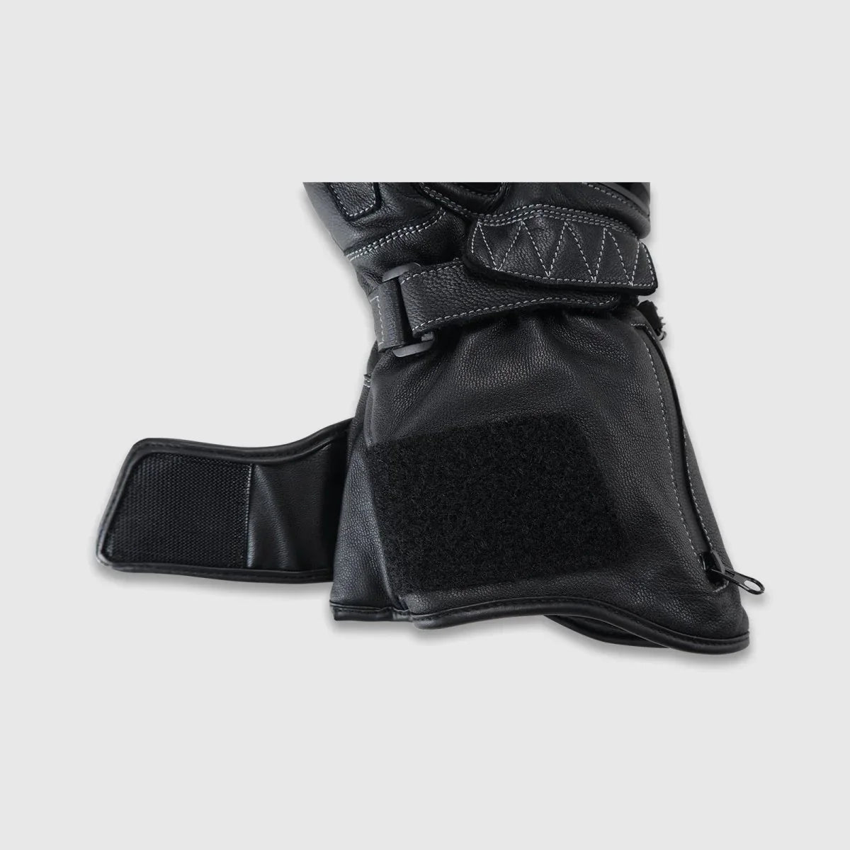 Open hook-and-loop gauntlet closure on a Tempest heated motorcycle glove