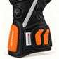 Tempest glove close-up showing the round fox-logo heat control, reflective strip and orange leather cuff details.