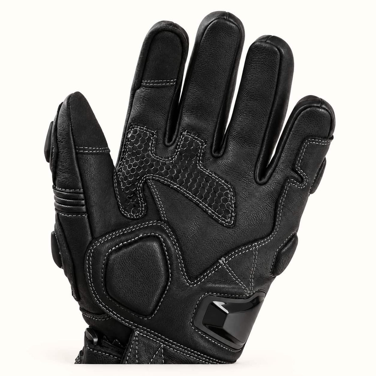 Tempest glove palm showing the textured grip panel, palm-heel slider and reinforced thumb base.