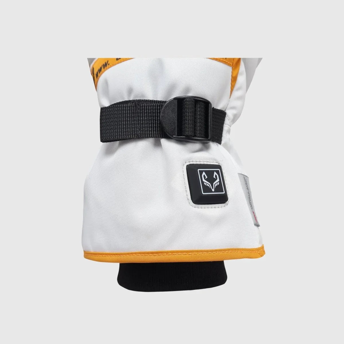 Close-up of the Toboggan heat control button and white wrist cuff