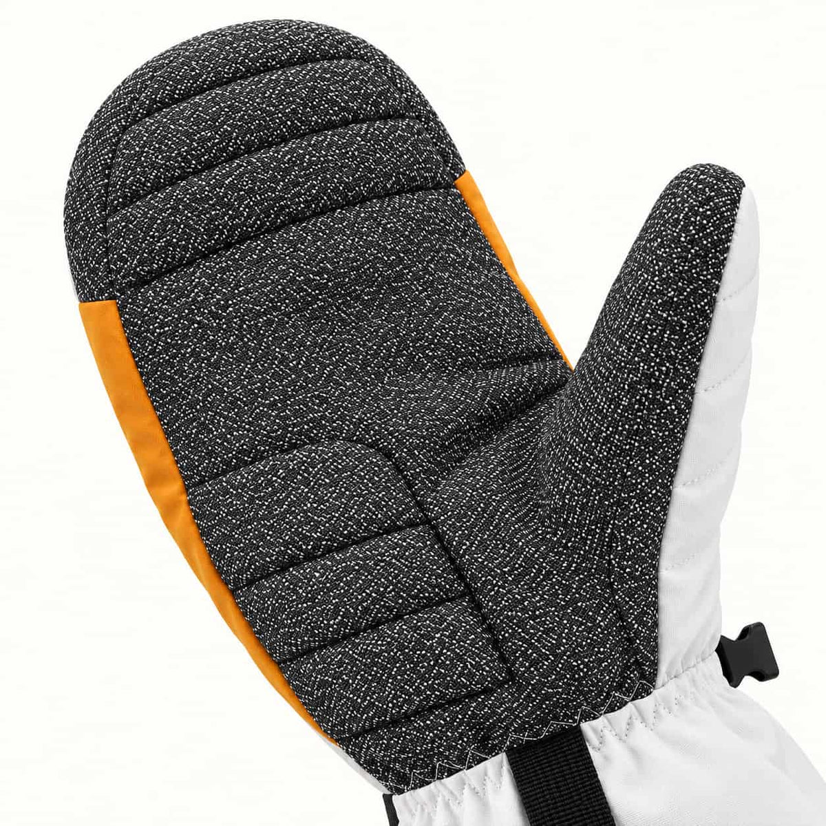Close-up of the Toboggan mitten's flecked Kevlar palm and thumb, showing the woven texture and stitching.