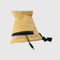 Open wrist battery pocket and power connector on a yellow Vellum 2.0 heated glove