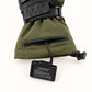 Vortex glove battery connected by a right-angle plug through the open horizontal cuff zipper.