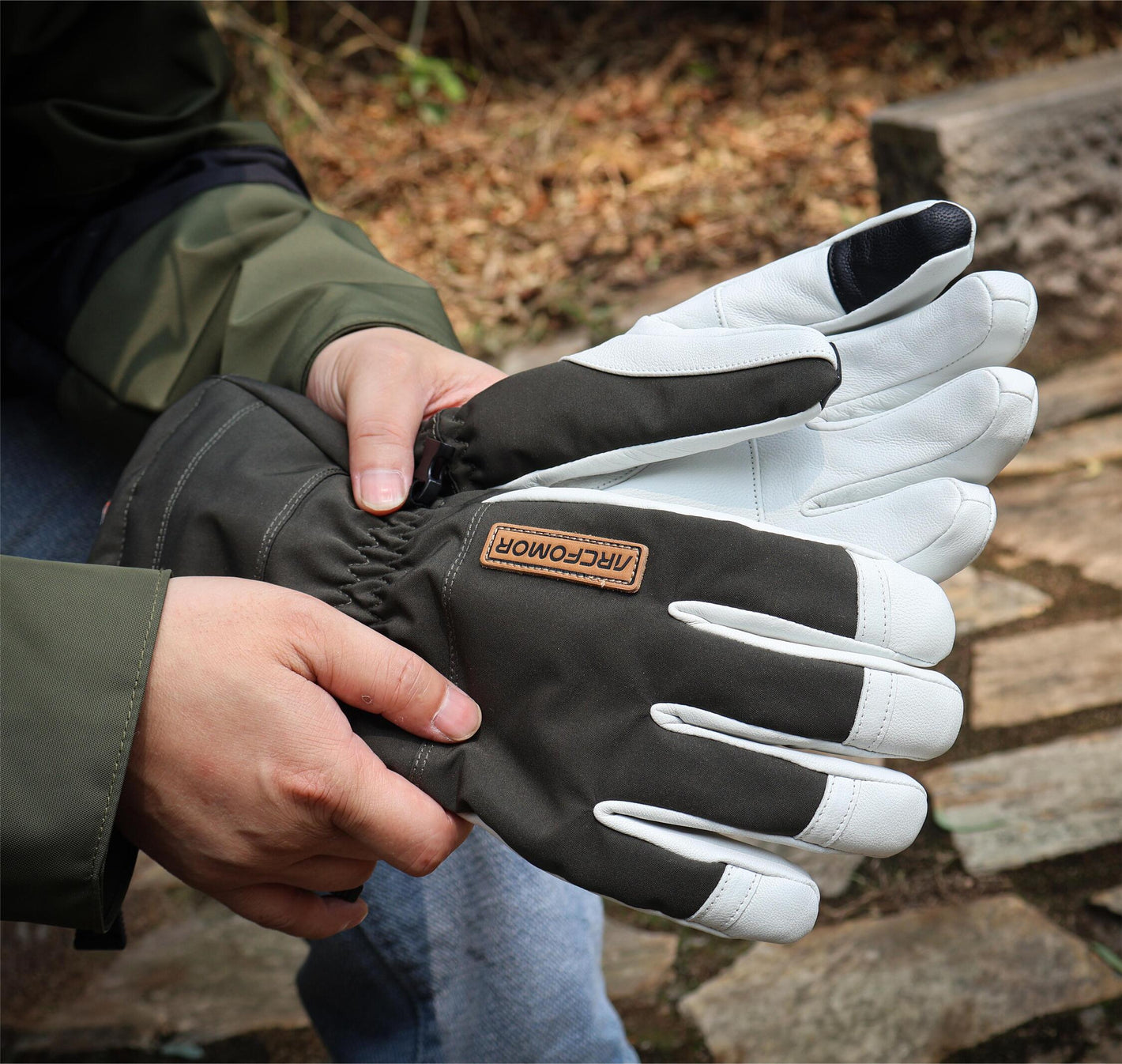 Army-green Yellowstone shell gloves showing the full goatskin palm and polyester back